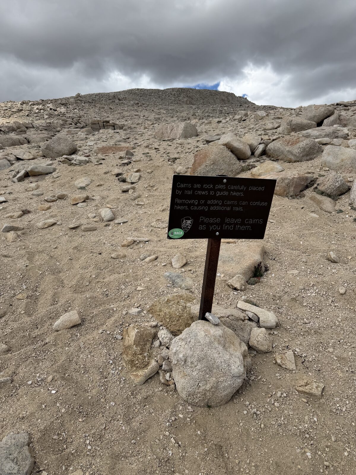 Trail sign by the cairn