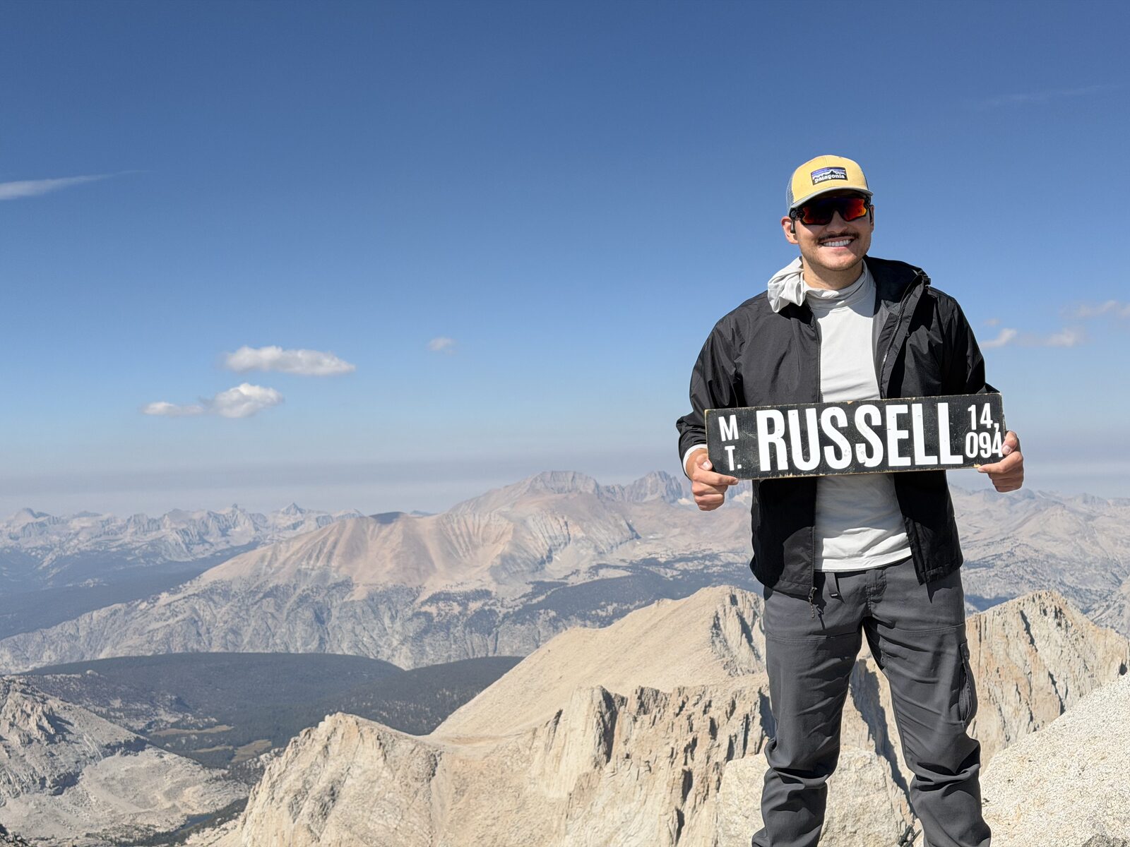 On the Mt. Russell summit with the sign