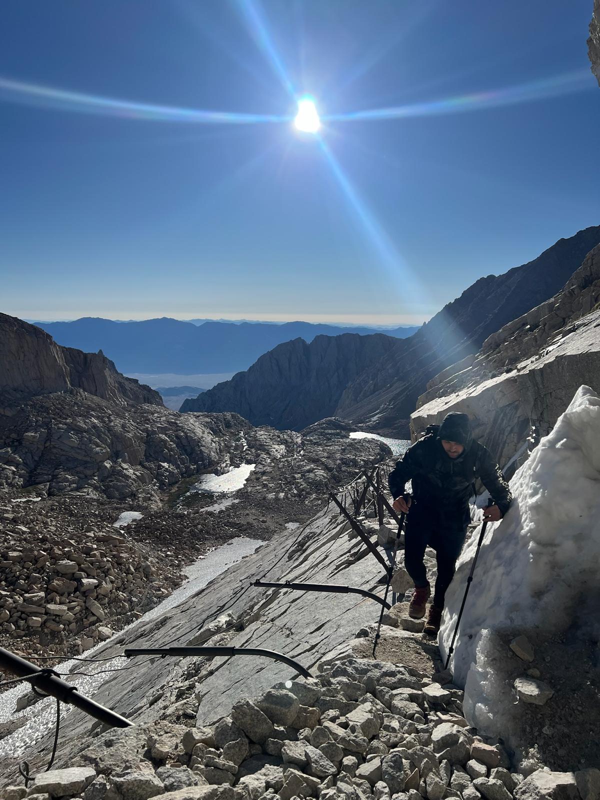 Cables and metal poles above the switchbacks